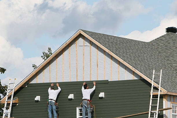 Professional Siding Repair technician working in South Mills, NC